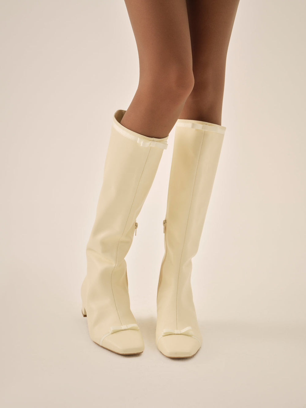 Claudine Cap Toe Boot — Cream